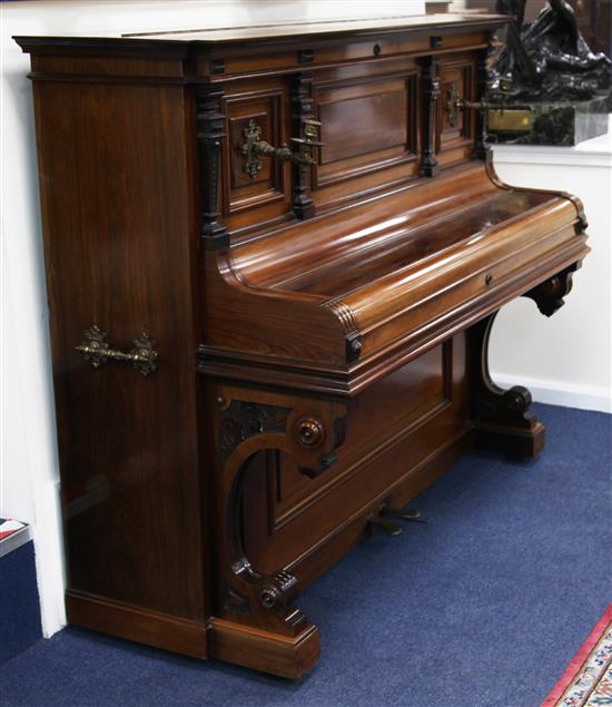 A late Victorian rosewood cased Bluthner upright piano, W.5ft 2in. D.2ft 3in. H.4ft 3in.
